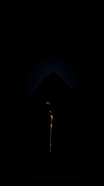 Minimal Dark Mountain with Orange Flow Wallpaper