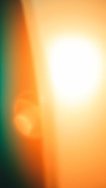 Warm Gradient Abstract Light Flare Mobile Wallpaper