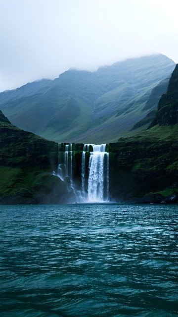 Misty Waterfall & Lake with Green Mountains Wallpaper