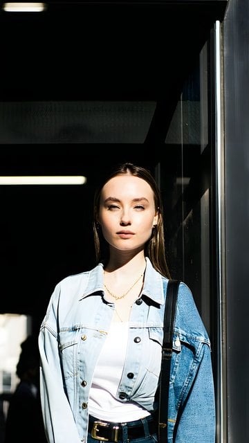 Stylish Urban Portrait: Woman in Denim, Dramatic Light