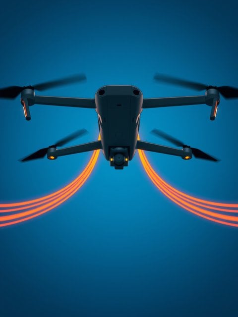 Modern Drone with Orange Trails on Deep Blue